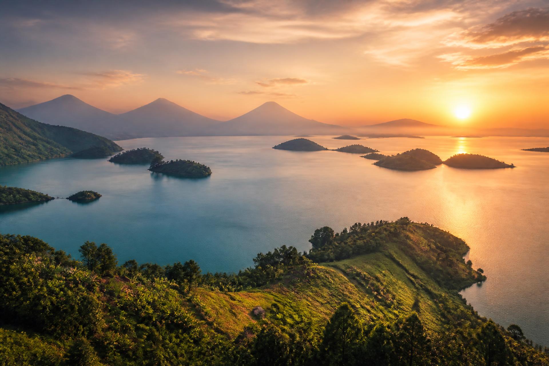 Sunset over Lake Kivu with volcano silhouettes in Rwanda